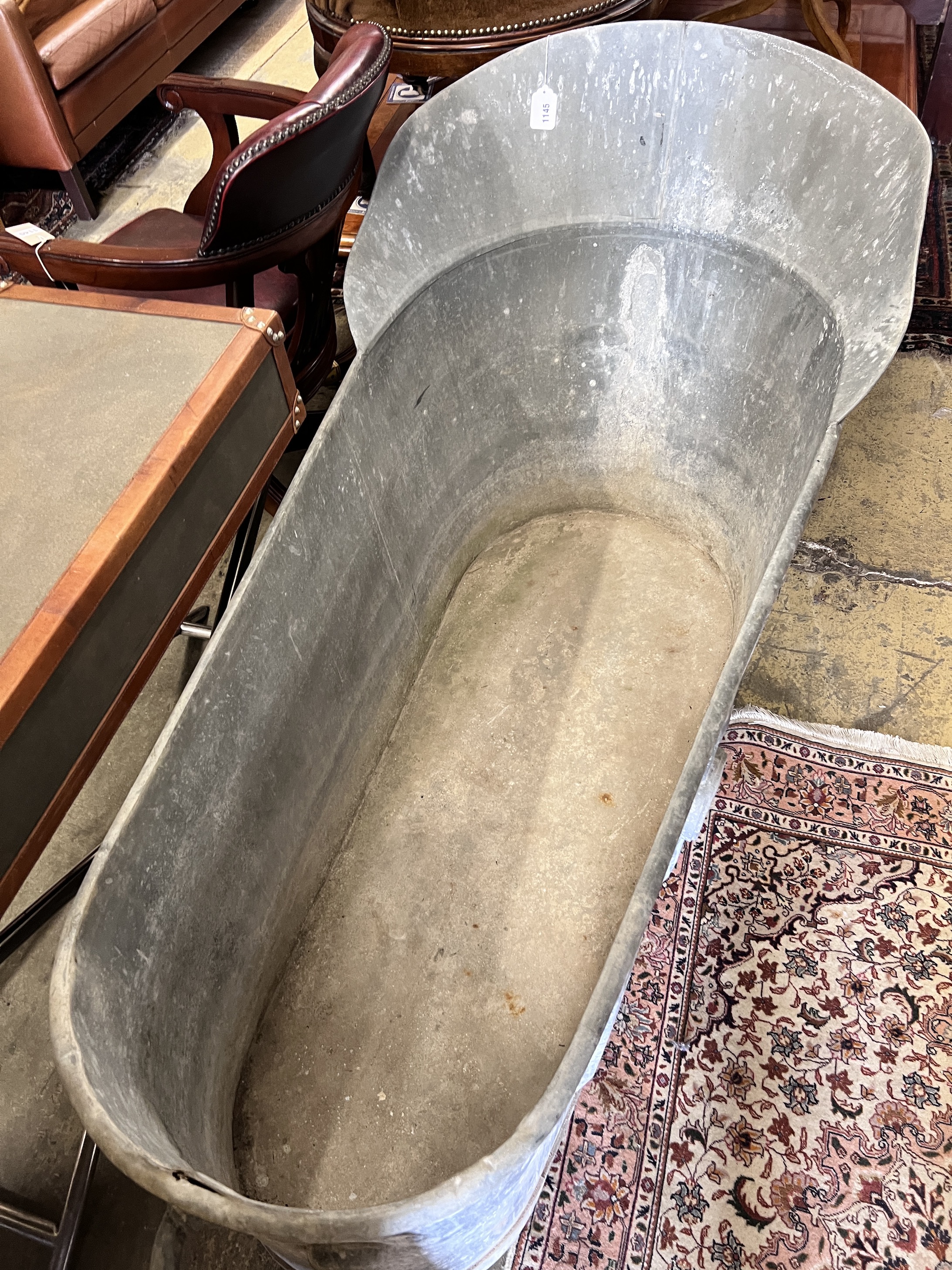 A 19th century French galvanised zinc bath tub, length 150cm